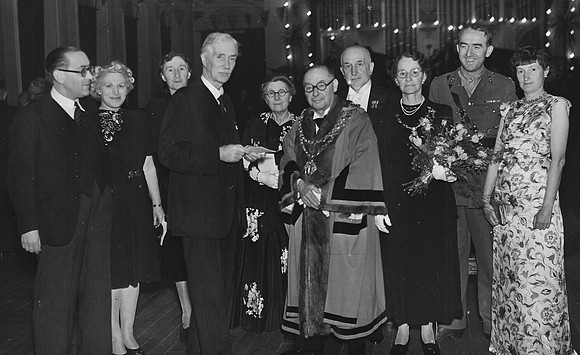 Alderman Stokes, Mayor of West Ham (1944-45) and guests, including Major F Elwyn Jones and his wife Jean Binder, at the Mayor's Reception, West Ham Town Hall