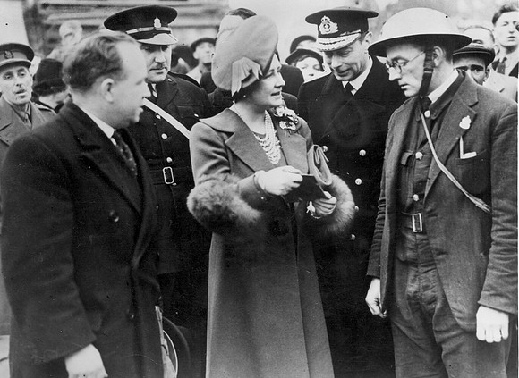 King George VI & Queen Elizabeth visiting Freemasons Road after an air raid. 23 April 1941.