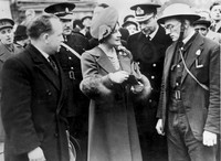 King George VI & Queen Elizabeth visiting Freemasons Road after an air raid. 23 April 1941.