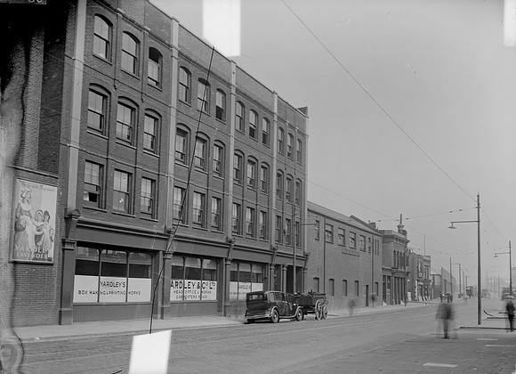 Stratford High Street. (North side). No 32 (Yardley's) to Messrs Rudd's new building. 24 August 1937.