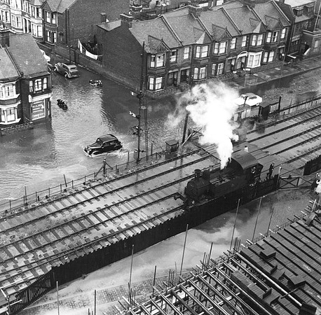 Storm flood at Tate & Lyle, Silvertown. 1957.