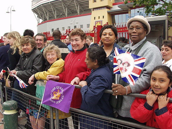 Crowds outside West Ham United FC await the Queen's Golden Jubilee visit. 2002.