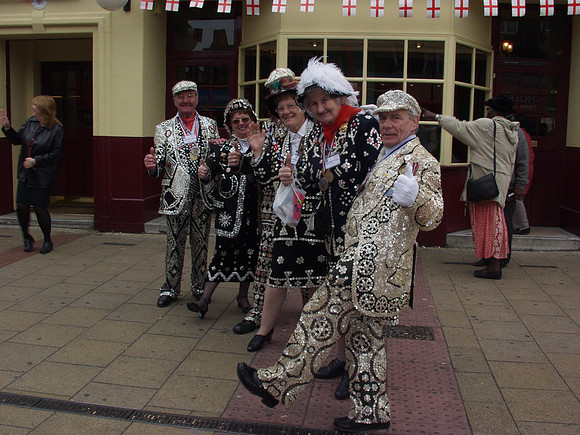 Pearly Kings and Queens on Green Street celebrating the Queen's Golden Jubilee visit. 2002.