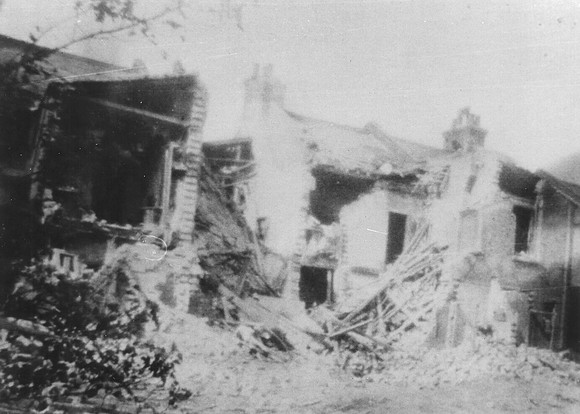 Ladysmith Road, Canning Town. Air raid damage. May 1918